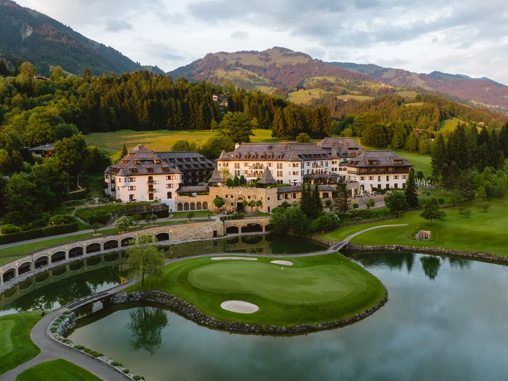 Luxury mountain resort with golf course on an island surrounded by water