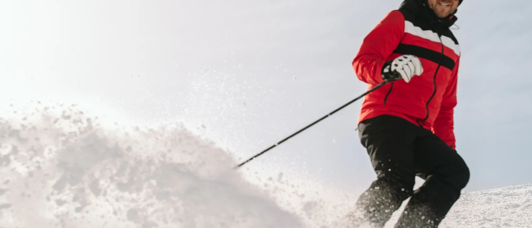 [Translate to Englisch:] Skifahrer auf Piste
