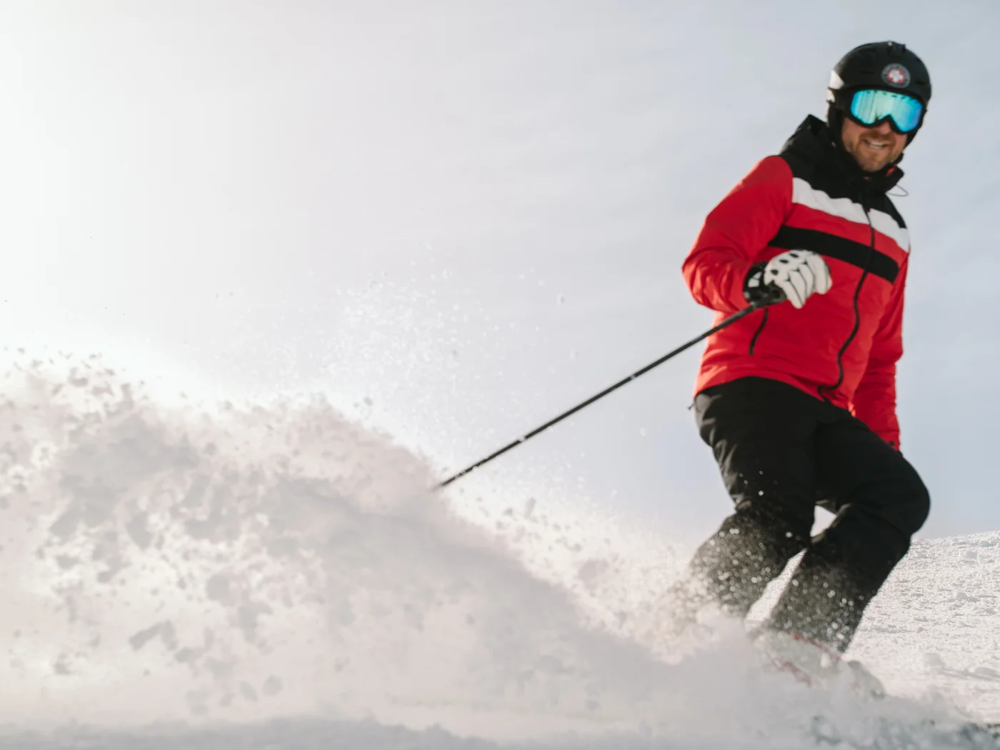 [Translate to Englisch:] Skifahrer auf Piste